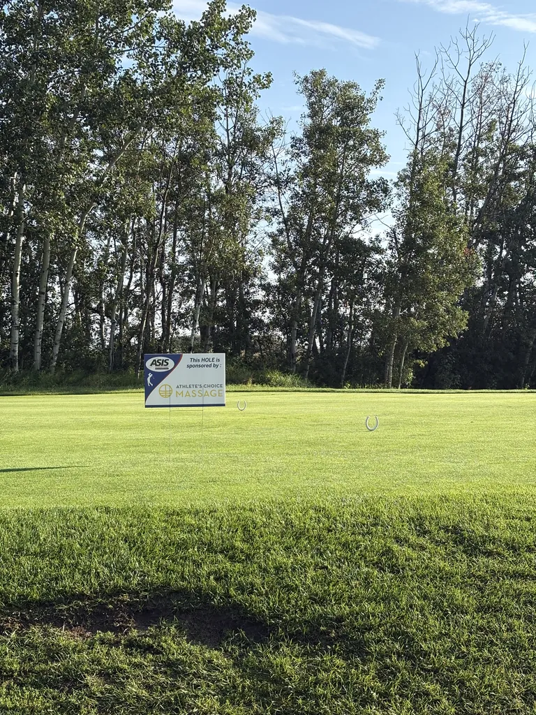 Athlete's Choice Massage hole sponsor sign on the course at The Ranch Golf & Country Club